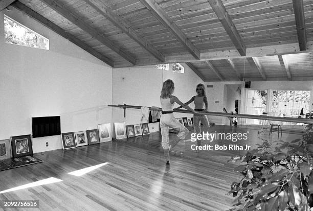 Actress Donna Mills performs yoga exercises in her home dance studio, March 18, 1983 in Beverly Hills, California.