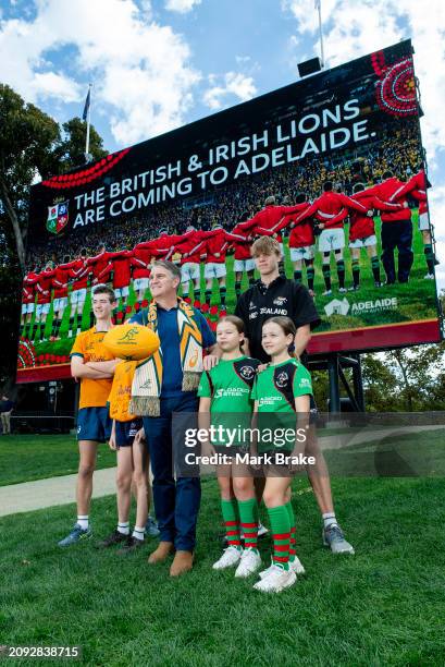 Classic Wallaby and member of the 1989 Combined Australia and New Zealand XV Tim Horan with local Rugby Union junior players Henri Graham Oliver...