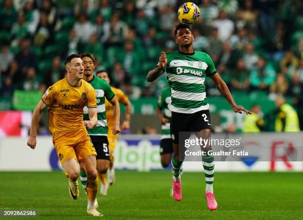Matheus Reis of Sporting CP with Robert Bozenik of Boavista FC in action during the Liga Portugal Betclic match between Sporting CP and Boavista FC...