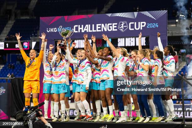 Alex Morgan and Abby Dahlkemper of the San Diego Wave lift the trophy as the team celebrates after NWSL Challenge Cup between San Diego Wave FC and...