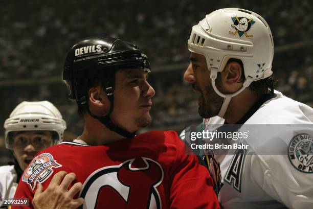 Keith Carney of the Anaheim Mighty Ducks gets in the face of Jamie Langenbrunner of the New Jersey Devils during Game Six of the 2003 Stanley Cup...