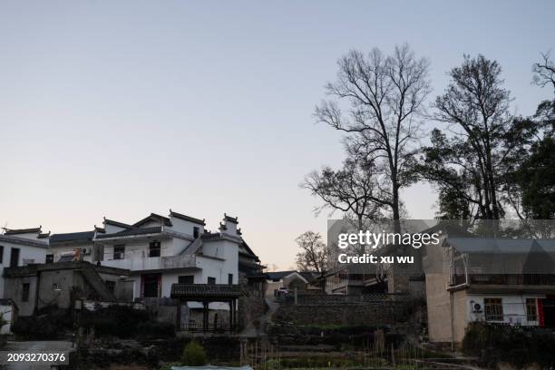 traditional ancient buildings in the evening - huangshan mountain range anhui province china stock pictures, royalty-free photos & images