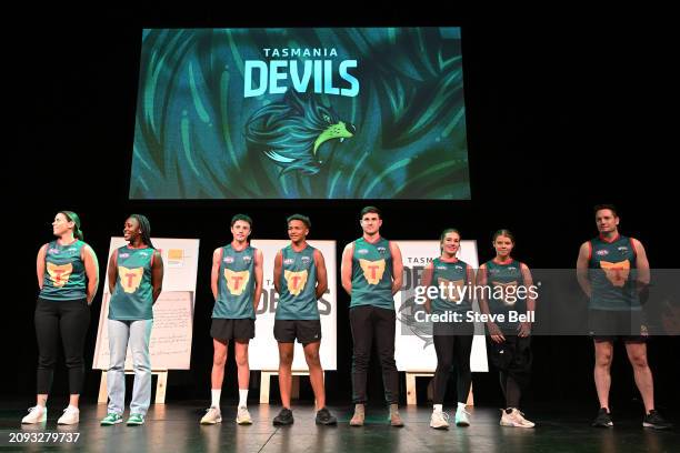 Future players unveil the new Tasmania Devils jersey during a media opportunity announcing the details for the Tasmanian AFL team, at Hobart Theatre...