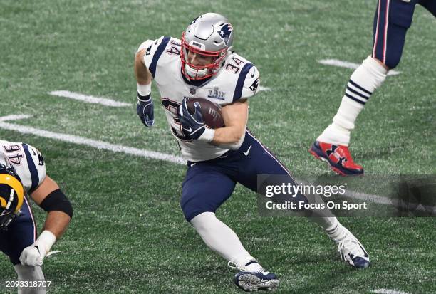 Rex Burkhead of the New England Patriots carries the ball against the Los Angeles Rams in the second half of Super Bowl LIII on February 3, 2019 at...