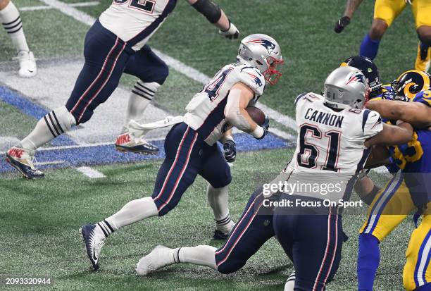 Rex Burkhead of the New England Patriots carries the ball against the Los Angeles Rams in the second half of Super Bowl LIII on February 3, 2019 at...