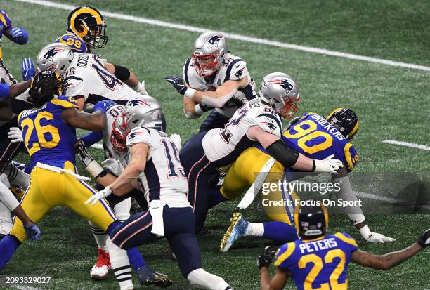 Rex Burkhead of the New England Patriots carries the ball against the Los Angeles Rams in the first half of Super Bowl LIII on February 3, 2019 at...