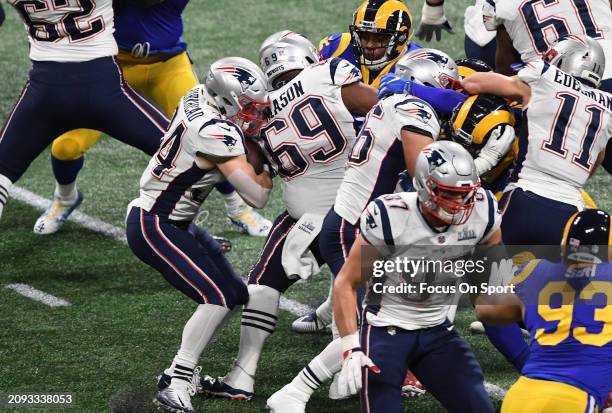 Rex Burkhead of the New England Patriots carries the ball against the Los Angeles Rams in the first half of Super Bowl LIII on February 3, 2019 at...