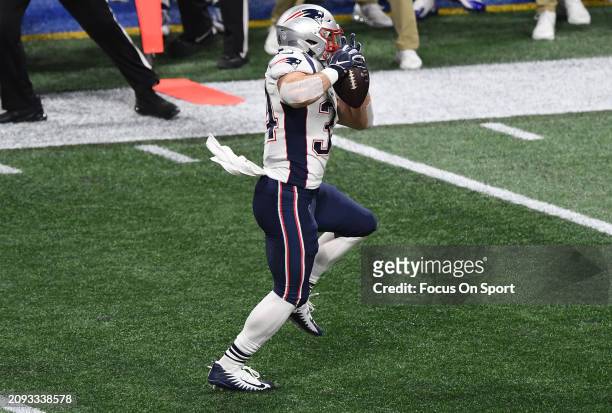 Rex Burkhead of the New England Patriots catches a pass against the Los Angeles Rams in the first half of Super Bowl LIII on February 3, 2019 at...