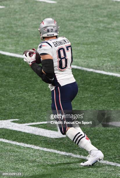 Rob Gronkowski to the New England Patriots catch a pass against the Los Angeles Rams in the first half of Super Bowl LIII on February 3, 2019 at...