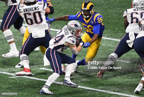 Rex Burkhead of the New England Patriots carries the ball against the Los Angeles Rams in the first half of Super Bowl LIII on February 3, 2019 at...