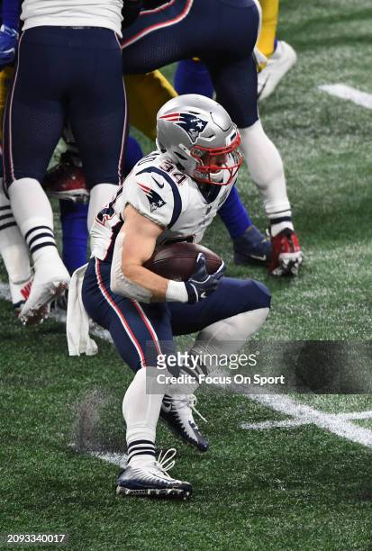 Rex Burkhead of the New England Patriots carries the ball against the Los Angeles Rams in the first half of Super Bowl LIII on February 3, 2019 at...