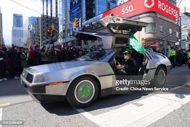 DeLorean DMC-12 classic car marches in the St. Patrick's Day Parade on March 17, 2024 in Toronto, Canada.