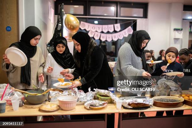 Members of the Baha'i faith and guests from other religions come together in the Ida Kinsey Centre to celebrate Nowruz , marking the spring equinox...