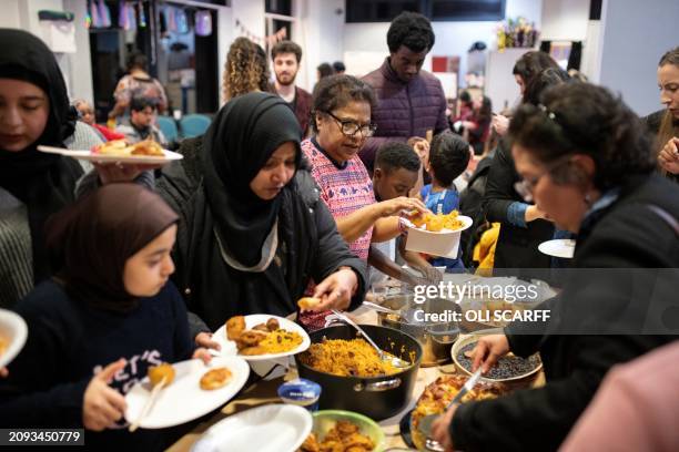 Members of the Baha'i faith and guests from other religions come together in the Ida Kinsey Centre to celebrate Nowruz , marking the spring equinox...