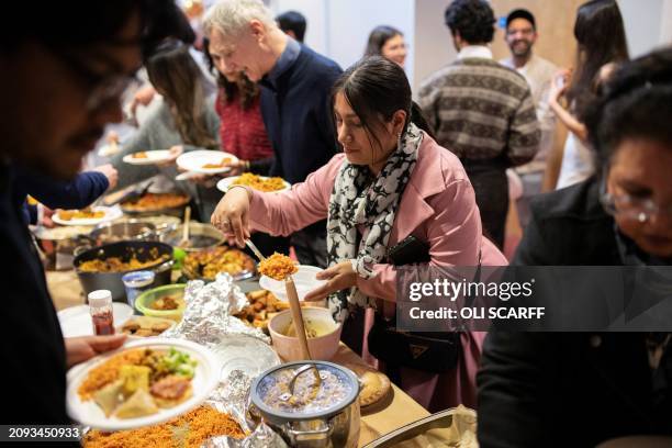 Members of the Baha'i faith and guests from other religions come together in the Ida Kinsey Centre to celebrate Nowruz , marking the spring equinox...