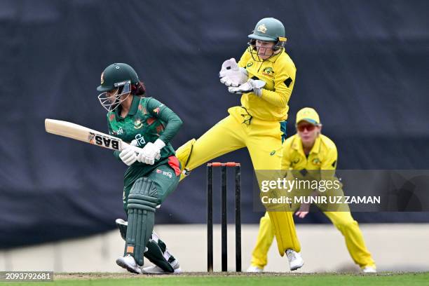 Bangladesh's Nigar Sultana plays a shot during the first one-day international cricket match between Bangladesh and Australia at Sher-e-Bangla...