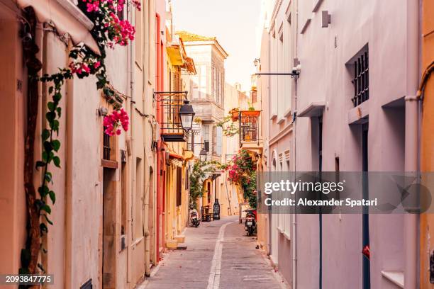 narrow alley in chania historic old town, crete island, greece - greece stock pictures, royalty-free photos & images