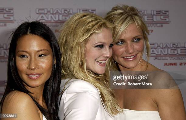 Actresses Lucy Liu, Drew Barrymore and Cameron Diaz attend the premiere of Columbia Pictures' film "Charlie's Angels 2: Full Throttle" at the...