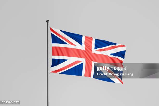 uk flag on white background - flagpole stock pictures, royalty-free photos & images