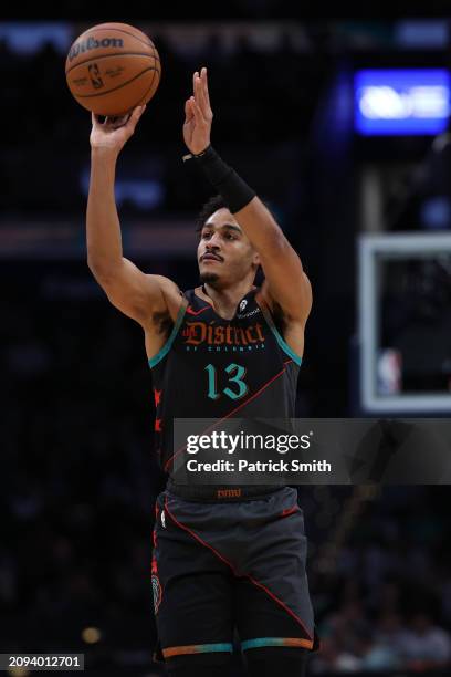 Jordan Poole of the Washington Wizards shoots the ball against the Boston Celtics during the first half at Capital One Arena on March 17, 2024 in...