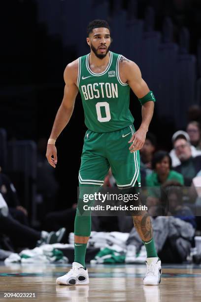 Jayson Tatum of the Boston Celtics plays defense against the Washington Wizards at Capital One Arena on March 17, 2024 in Washington, DC. NOTE TO...