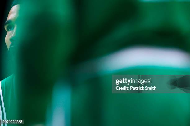 Jayson Tatum of the Boston Celtics looks to shoot a free throw against the Washington Wizards at Capital One Arena on March 17, 2024 in Washington,...