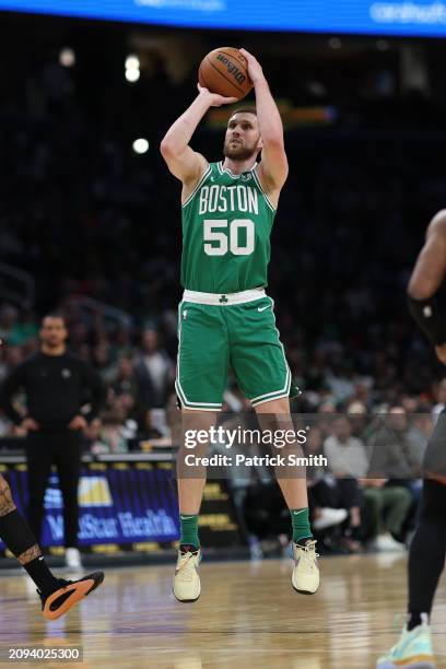 Svi Mykhailiuk of the Boston Celtics shoots against the Washington Wizards during the second half at Capital One Arena on March 17, 2024 in...