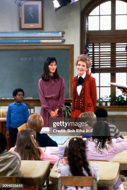 United States First Lady Nancy Reagan films a classroom scene on the set of the television show 'Diff'rent Strokes' and is joined by Actor Gary...