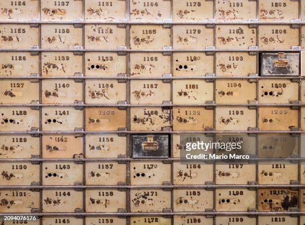 old bank safety deposit boxes - bank vault stock pictures, royalty-free photos & images