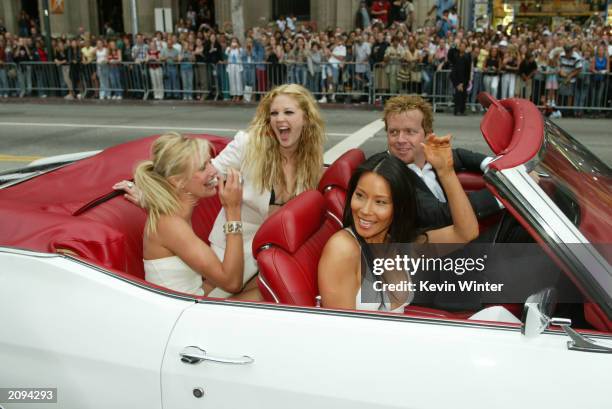 Actresses Cameron Diaz, Drew Barrymore, Lucy Liu and director Mc G arrive to the premiere of Columbia Pictures' film "Charlie's Angels 2: Full...