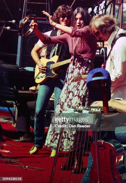 Singer and Songwriter Emmylou Harris performs in Los Angeles in late 1975 along with guitar player Rodney Crowell and Rock and Roll Hall of Fame...