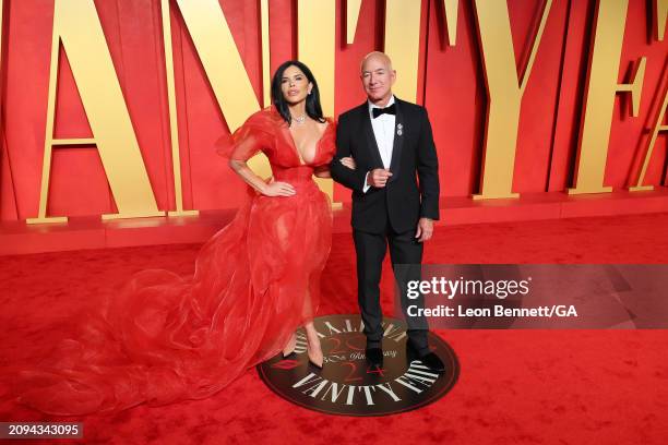 Lauren Sanchez and Jeff Bezos attend 2024 Vanity Fair Oscar Party Hosted by Radhika Jones at Wallis Annenberg Center for the Performing Arts on March...