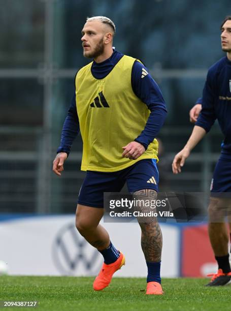 Federico Dimarco of Italy in action during a Italy training session at Centro Sportivo Giulio Onesti on March 18, 2024 in Rome, Italy.