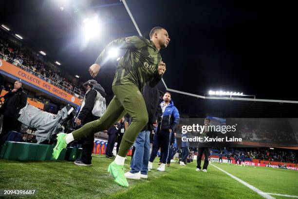 Captain of Paris Saint-Germain, Kylian Mbappe enter the fiedd during the Ligue 1 Uber Eats match between Montpellier HSC and Paris Saint-Germain at...