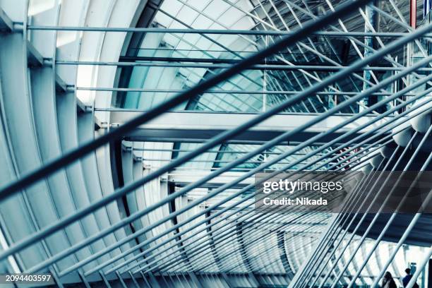 modern paris airport architecture with steel and glass - charles de gaulle stock pictures, royalty-free photos & images
