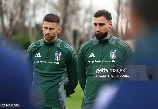 Gianluigi Donnarumma and Guglielmo Vicario of Italy attends before a Italy training session at Centro Sportivo Giulio Onesti on March 18, 2024 in...