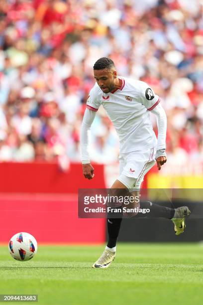 Yousseff En-Nesyri of Sevilla FC scores the teams first goal during the LaLiga EA Sports match between Sevilla FC and Celta Vigo at Estadio Ramon...