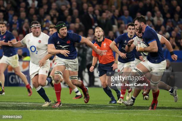 Francois Cros, Charles Ollivon of France in action during the Guinness Six Nations 2024 match between France and England at Groupama Stadium on March...