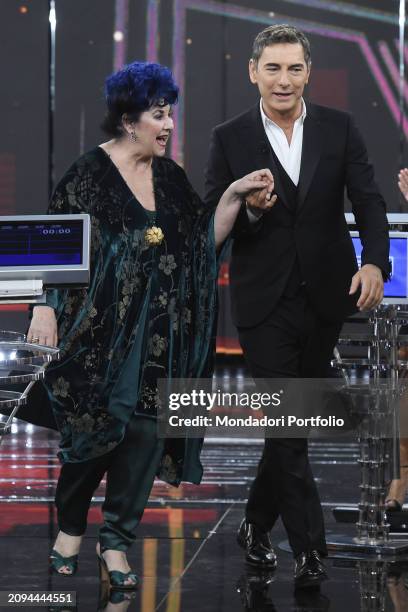 Italian conductor Marco Liorni and Italian actress Marisa Laurito during the broadcast Rai L'eredita special episode Sanremo. Rome , 16 March 2024
