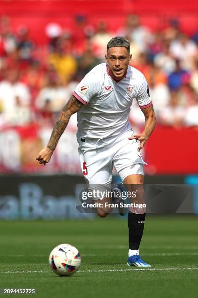 Competes for the ball with XXX during the LaLiga EA Sports match between Sevilla FC and Celta Vigo at Estadio Ramon Sanchez Pizjuan on March 17, 2024...