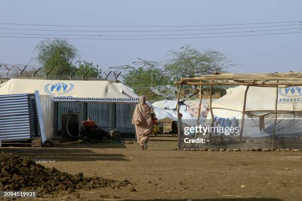 Picture taken on March 20 shows people who fled Khartoum and Jazira states in war-torn Sudan at a camp for the internally displaced in southern...