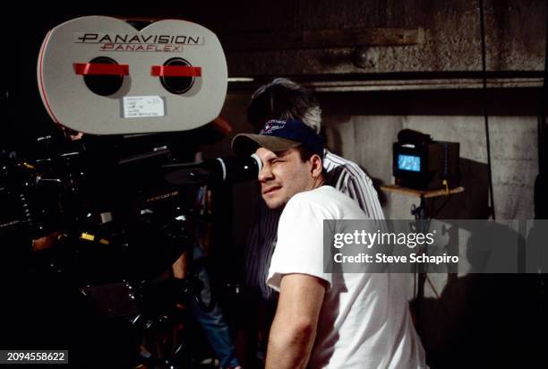 American actor & film director Christian Slater looks through a camera lens on the set of his short film 'Museum of Love,' Los Angeles, California,...