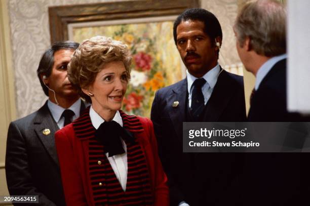View of US First Lady Nancy Reagan and actor Conrad Bain in a scene from an episode of the TV show 'Diff'rent Strokes' , Los Angeles, California,...