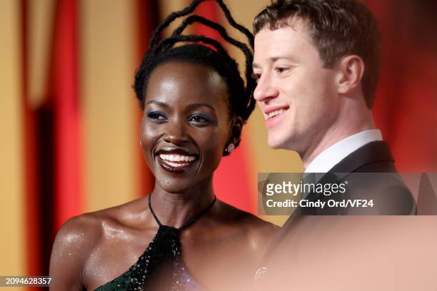 Lupita Nyong'o and Joseph Quinn attend the 2024 Vanity Fair Oscar Party Hosted By Radhika Jones at Wallis Annenberg Center for the Performing Arts on...