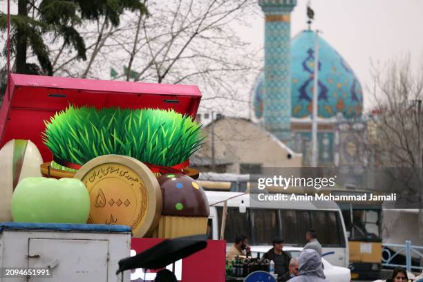 People prepare for the Persian New Year on March 18, 2024 in Tehran, Iran. Nowruz is the Iranian or Persian New Year celebrated by various...