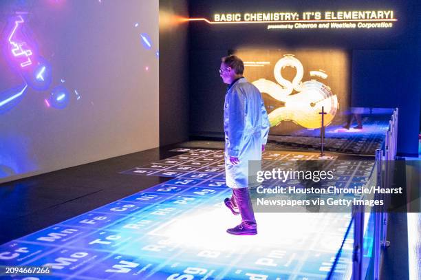 Special Projects manager Paul Bernhard demonstrates the Megatable, an enormous Periodic Table where interactive floor tiles represent the various...