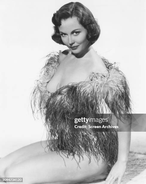 Hazel Court wearing feathered costume circa 1958.