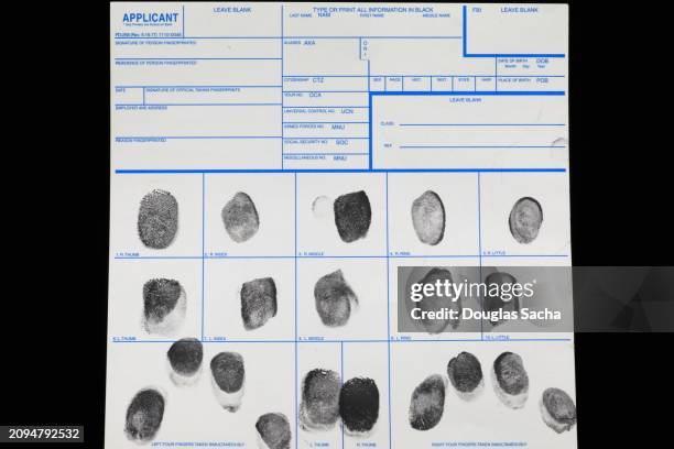 fingerprints on criminal record document - fbi arrest stock pictures, royalty-free photos & images