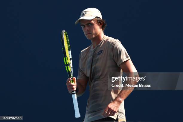 Adam Walton of Australia reacts during his men's singles qualifying match against Thiago Monteiro of Brazil during the Miami Open at Hard Rock...