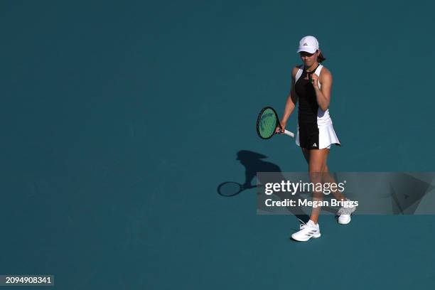 Katie Volynets of the United States reacts during her women's singles qualifying match against Yanina Wickmayer of Belgium during the Miami Open at...